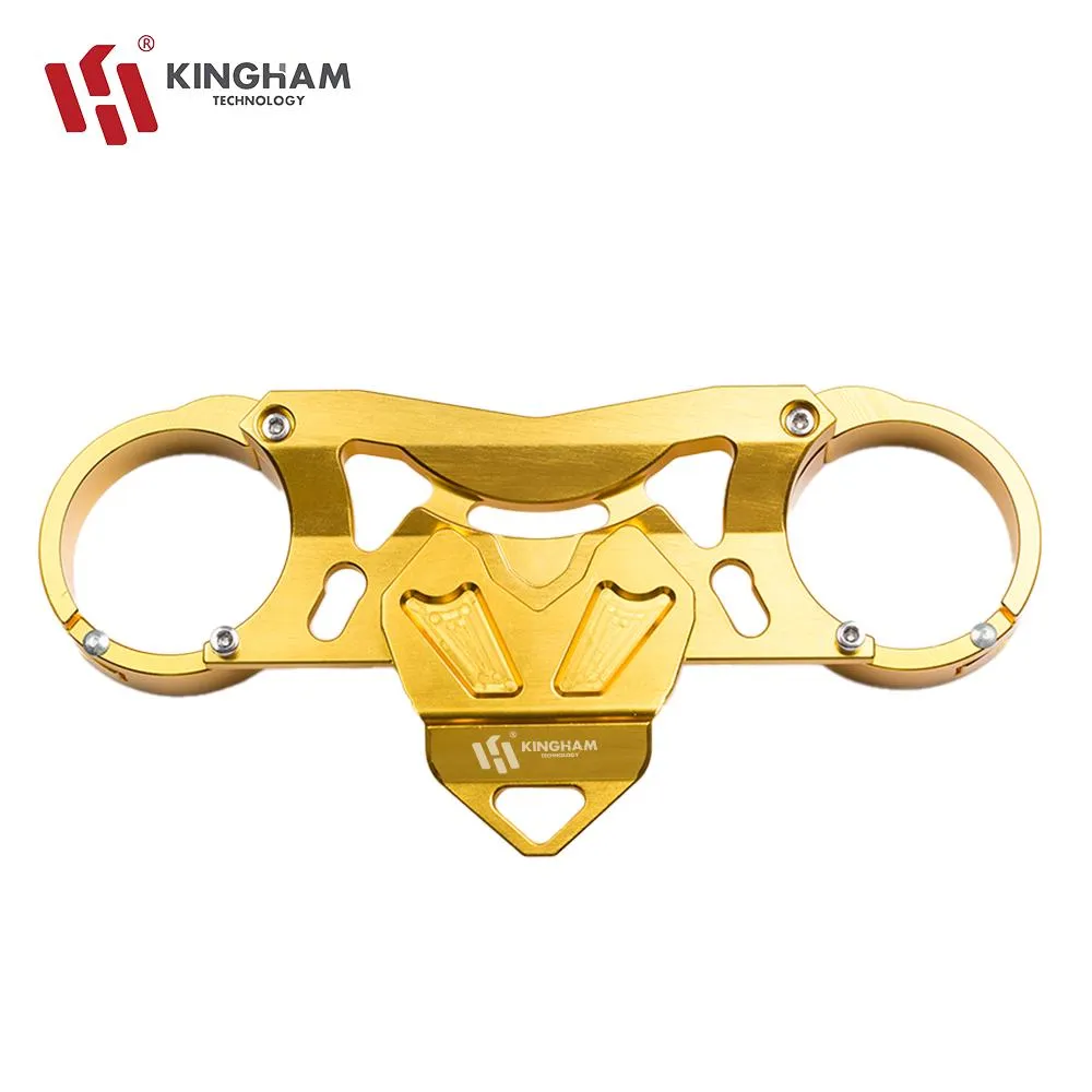 Gold motorcycle triple clamp component